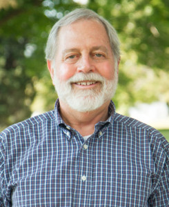 Bob Keiter, a senior man with white hair and beard wearing a blue plaid collared shirt