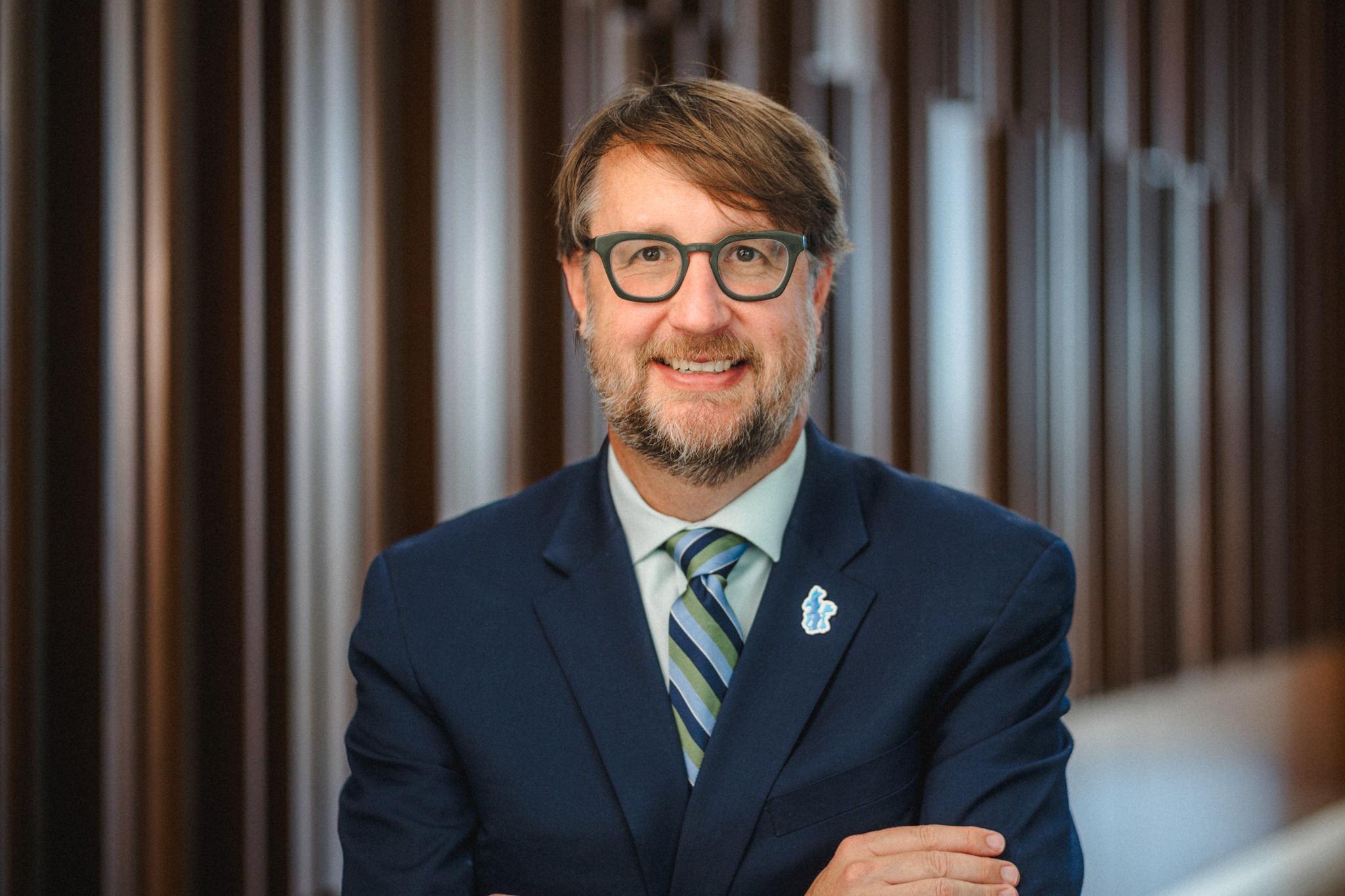 Professor Brigham Daniels, a white man with light brown hair, glasses, and a light brown beard.