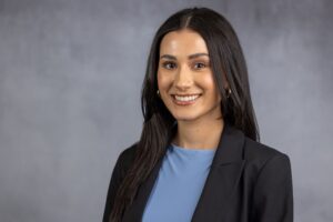 Valeria Jimenez, a young Latina woman with long dark-brown hair and brown eyes